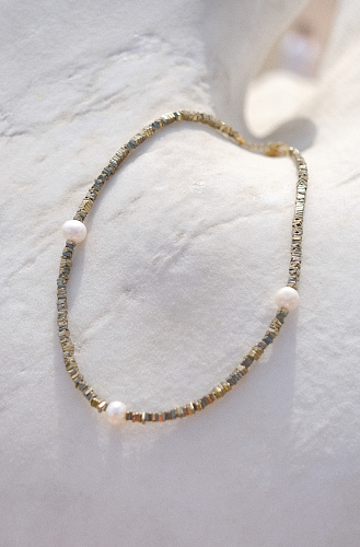 Ожерелье с тремя жемчужинами